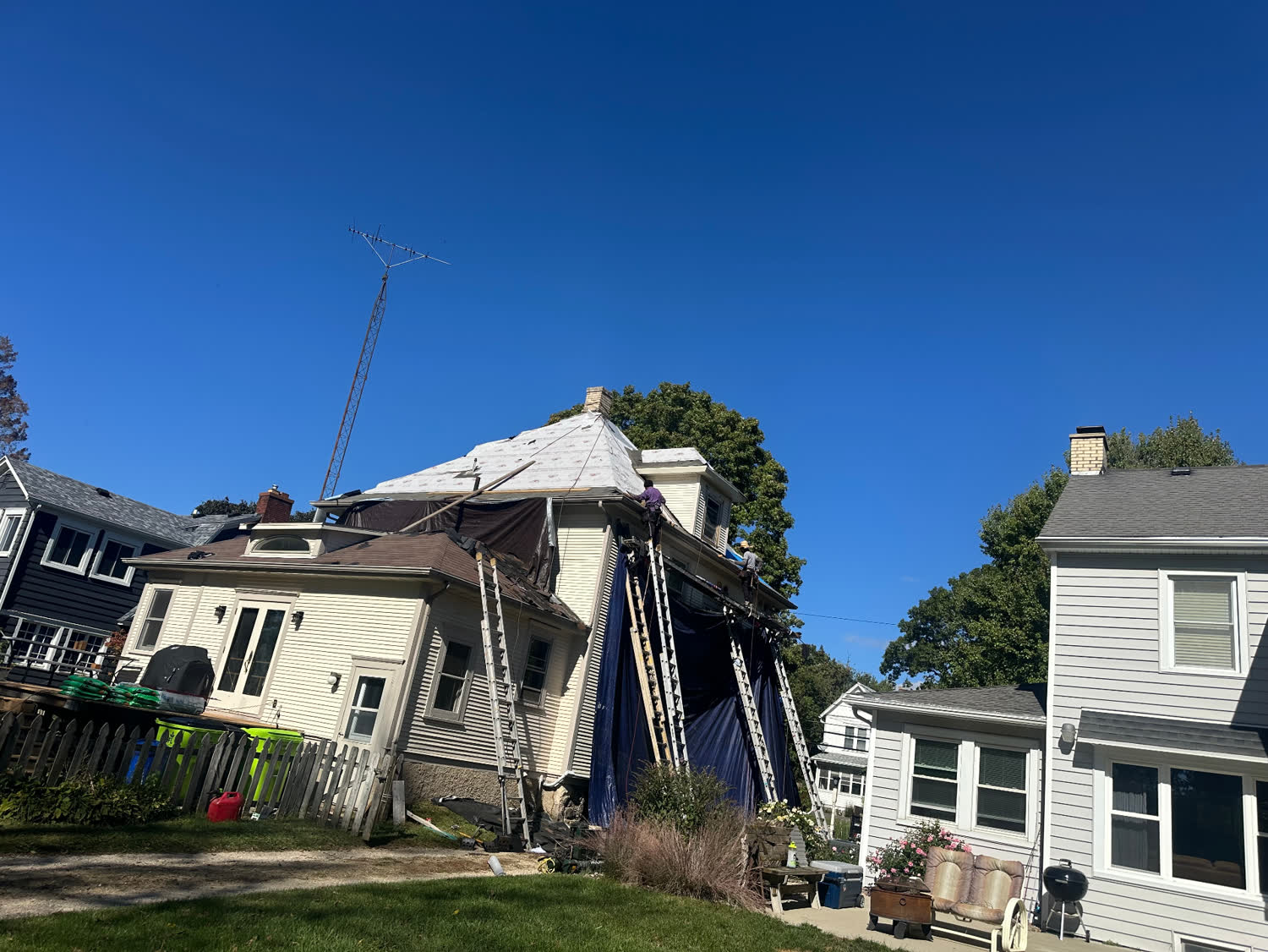 Historic Steep-Slope Reroof — Tall historic residence · Full protection & tear-off in Elgin, IL by Avilas Construction