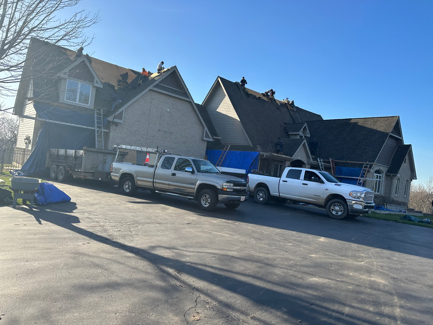 Estate Roof Replacement — Multi-gable mansion · Full architectural shingle reroof in Naperville, IL by Avilas Construction