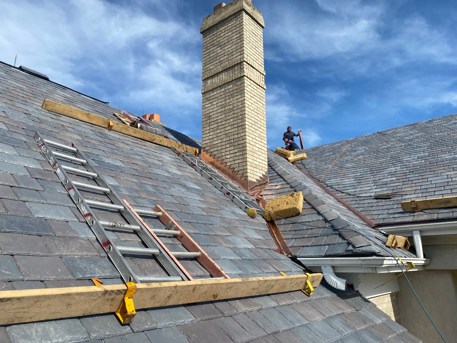 Slate & Copper Detailing — Premium slate field with hand-soldered copper flashing in Oak Park, IL by Avilas Construction